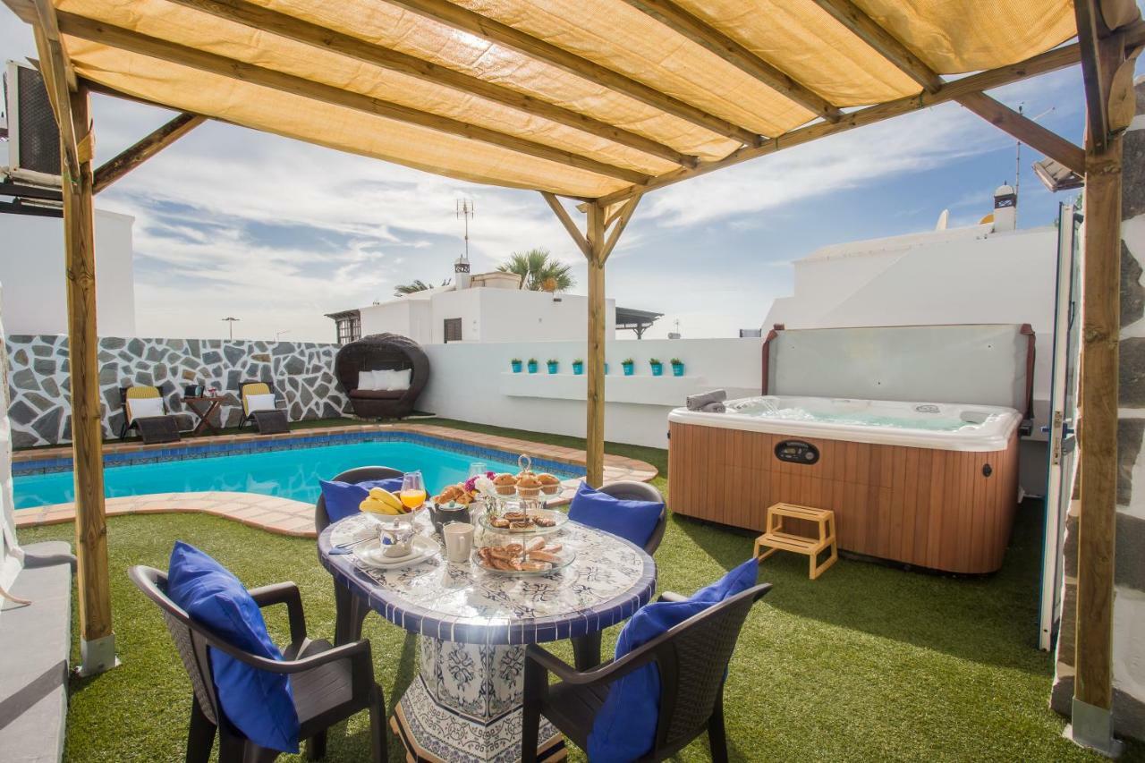 Palm Villa ปูแอร์โตเดลคาร์เมน ภายนอก รูปภาพ