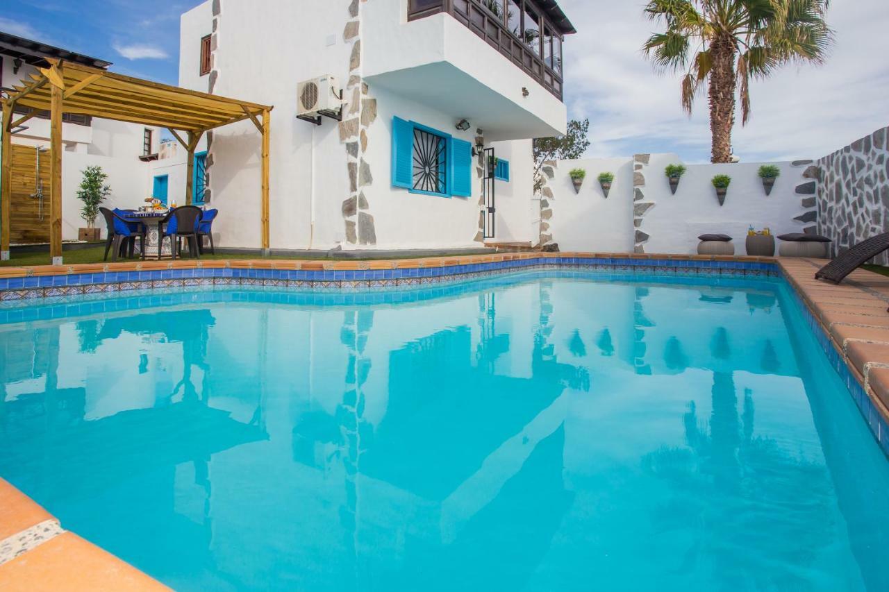 Palm Villa ปูแอร์โตเดลคาร์เมน ภายนอก รูปภาพ